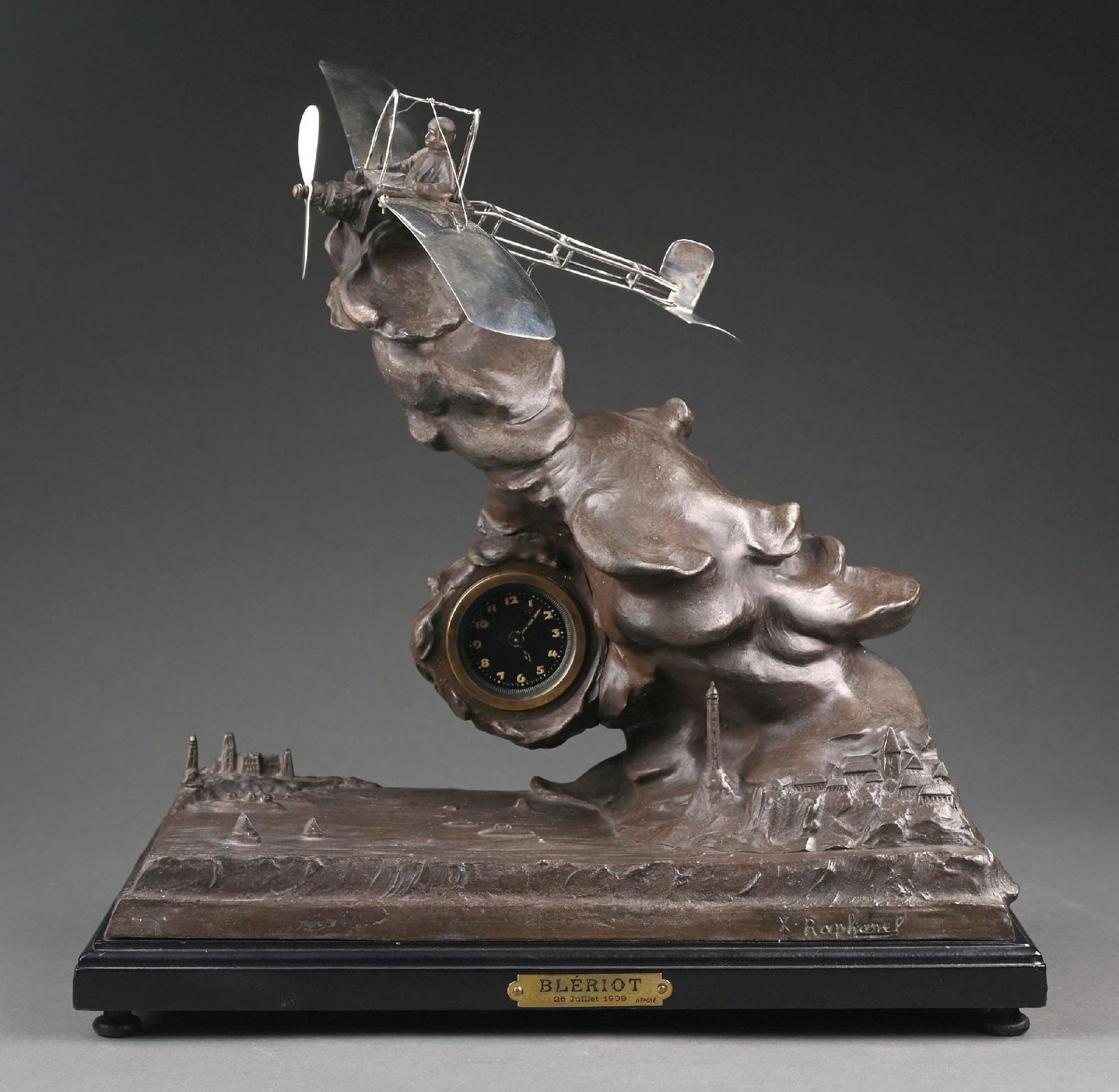 MONUMENTAL XAVIER RAPHANEL SCULPTURE OF LOUIS BLERIOT'S HISTORIC FIRST FLIGHT ACROSS THE ENGLISH: C. 1909. Xavier Raphanel (1876-1957) was a French sculptor known for his chryselephantine (bronze and ivory) works, particularly figures of Napoleon and other historical figures. This representation o