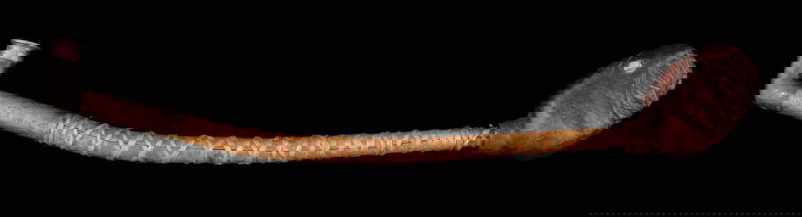 LOT OF 2: ALASKAN EARLY 20TH CENTURY TLINGIT CARVED SNAKE HEAD & SINEW/WOODEN PIPE: Lot of 2: 1. Early 20th century Alaskan Tlingit carved snake head pipe with abalone shell/mother of pearl eyes, measuring 2-3/4" in length. 2. Wooden and brass pipe with sinew lashing, measuring 10-1/