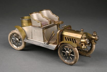 EARLY AUTOMOBILE CIGARETTE HOLDER