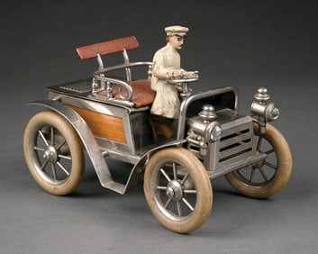 FIGURAL AUTOMOBILE CIGARETTE HOLDER