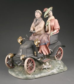 VINTAGE CAPODIMONTE PORCELAIN AUTO FIGURINE WITH MAN AND WOMAN