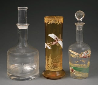 LOT OF 3: GLASS VASE WITH AUTO & PLANE GRAPHIC AND TWO DECANTERS