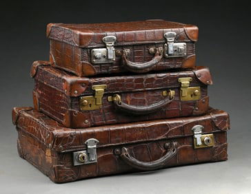 STACK OF THREE ALLIGATOR LEATHER SUITCASES