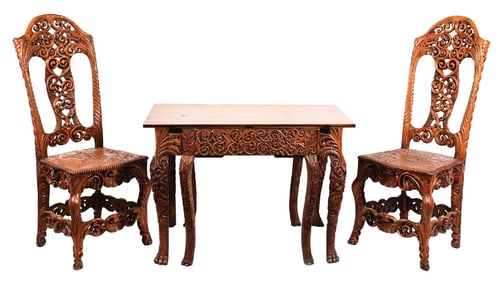 ORNATELY CARVED PAIR OF WOOD HIGH BACK CHAIRS W/ AN ORNATELY CARVED TABLE