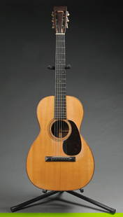 1927 MARTIN 0-21 PRE-WAR STEEL STRING ACOUSTIC GUITAR WITH CASE: Serial number 30538. CONDITION: Adirondack spruce top and Rosewood sides and back. Faux tortoise pick guard was added. Velvet-lined hard case, unmarked. Solid guitar with a slight lift to the string b