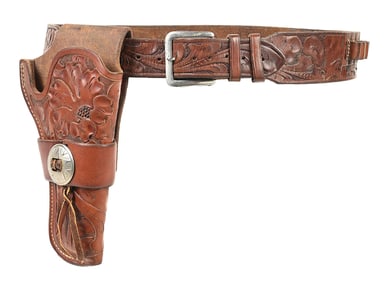A GEORGE LAWRENCE CO. COWBOY HOLSTER AND BELT RIG