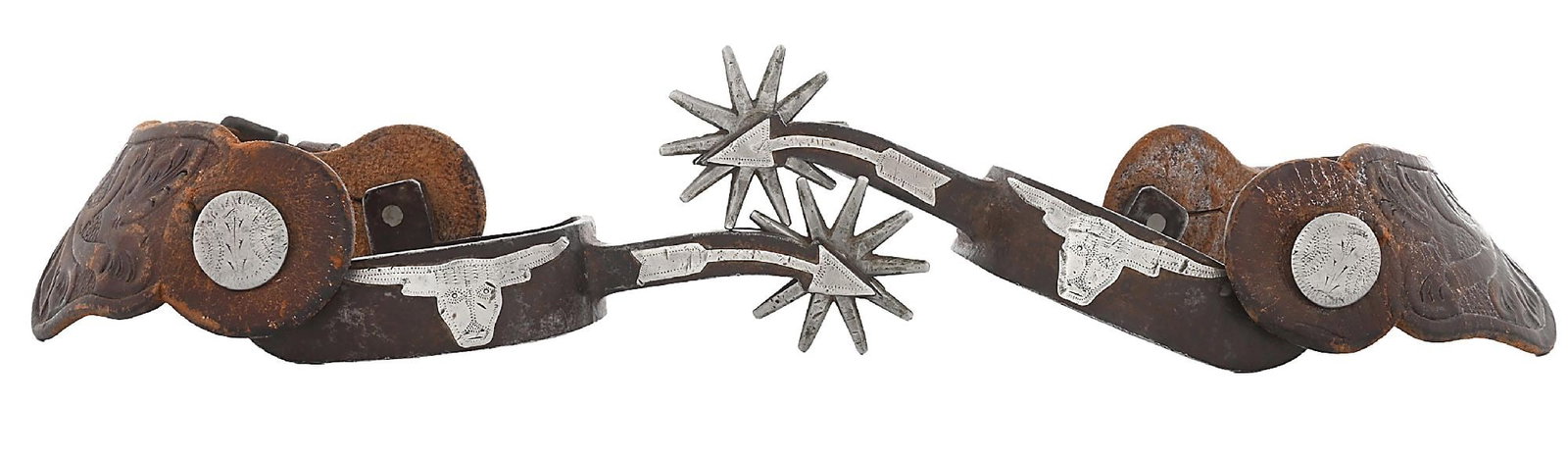 AUGUST BUERMANN #1044 TEXAS LONGHORN SPURS: A true Texas Crockett style 121 or Kelly Bros. bullhead spur made by Buermann. The stepped 1" band has a early type longhorn overall, the 2 3/4" shank is in the arrow design with overlay. These have a