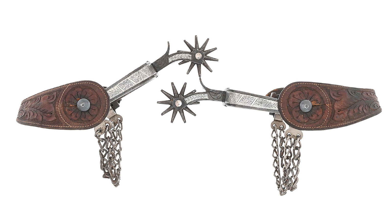 AUGUST BUERMANN #1294 "SAN JOSE" SPURS: A wonderful classic California pattern with taped 3/4" band decorated with finely floral engraved inlays, a 2" drop shank and 1 3/4" rowel. Double heel chains and vintage tooled straps. In great condi