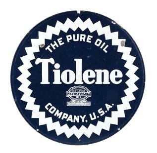 TIOLENE MOTOR OIL PORCELAIN SIGN W/ SAW TOOTH GRAPHIC: DSP. C. 1930s. Maker Marked Burdick. CONDITION: Sign shows fair color and gloss throughout each side, with moderate surface scratching as well as chipping in the outer fields. Sign shows light chippin