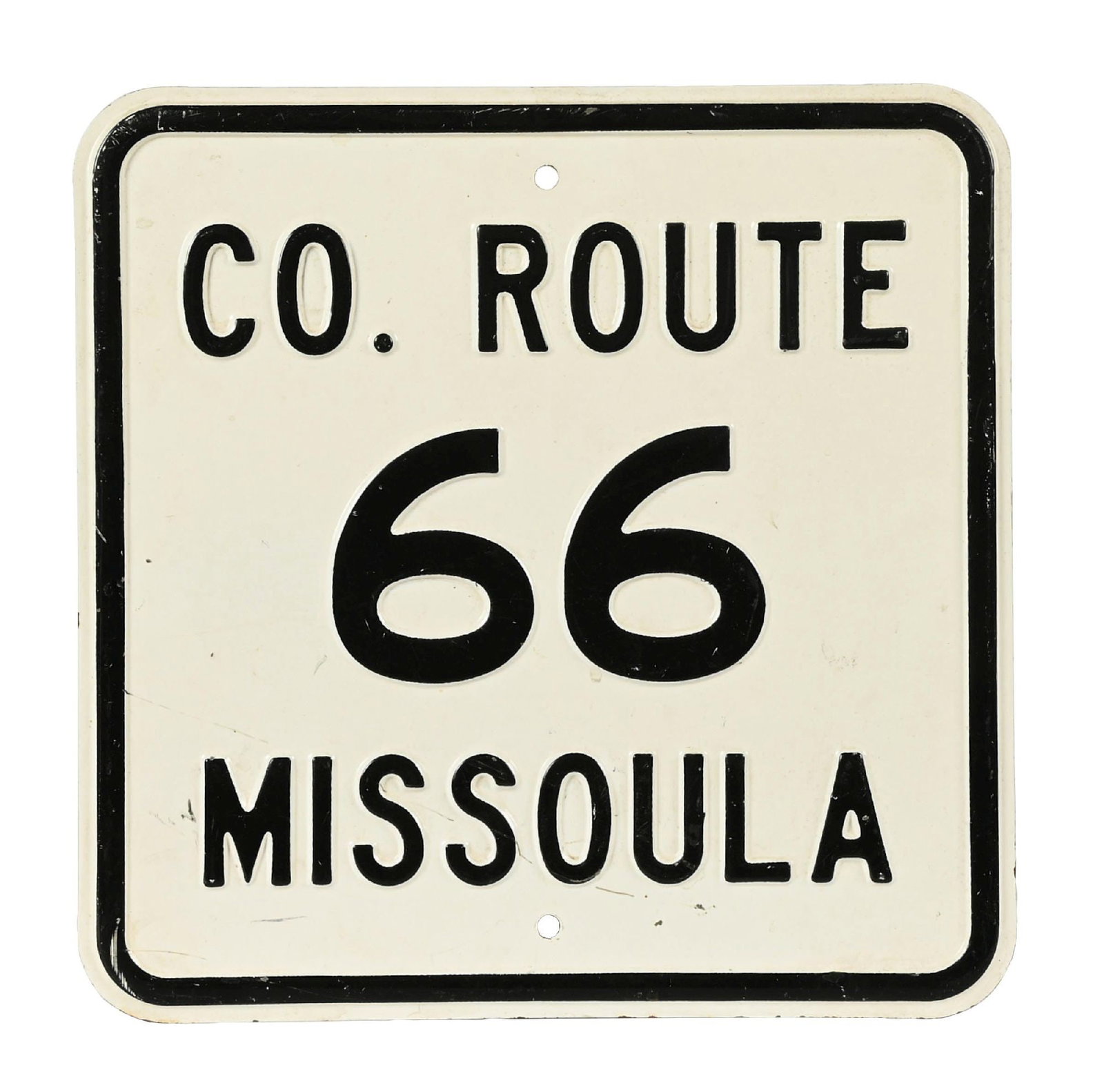 COUNTY ROUTE 66 MISSOULA MONTANA STAMPED STEEL SIGN: SST. C. 1950s. CONDITION: Bright color and gloss throughout, showing light areas of surface scratching as well as light paper marks. Light paint wear along the raised outer edge, but overall bright an
