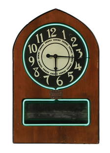TELECHRON NEON ADVERTISING CLOCK W/ MOTORIZED SPINNING ADVERTISING WHEEL: C. 1950s. CONDITION: Clock is in excellent working condition with bright blue glowing neon throughout. The spinning advertising mechanism is complete and in working condition, showing three separate a