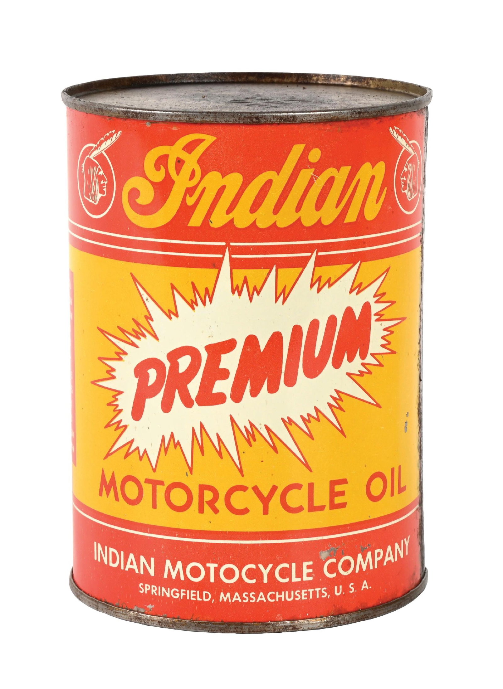 INDIAN PREMIUM MOTORCYCLE OIL ONE QUART CAN: One Quart Can. C. 1940s. CONDITION: Can shows bright color and gloss throughout, with some minor areas of light scratching in the outer field. Can shows moderate wear at the seam light and wear at the