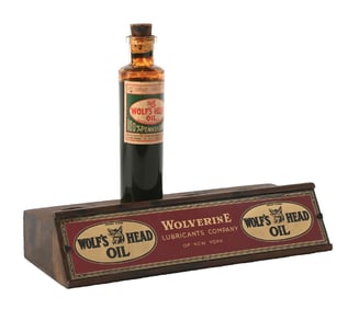 WOLFS HEAD MOTOR OILS SALESMEN SAMPLE OIL BOTTLE W/ GLASS & WOOD DISPLAY