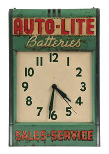 AUTO-LITE BATTERIES SALES & SERVICE ADVERTISING CLOCK: C. 1950s. CONDITION: Clock is in working condition, showing good color and gloss with moderate to heavy surface scratching as well as areas of staining. Chrome trim is in very good condition with ligh