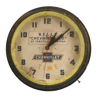 CHEVROLET TIME ADVERTISING NEON CLOCK: C. 1950s. CONDITION: Clock is in as-found condition, showing intact and working neon, with original privilege panel in the interior for Kelly Chevrolet in St. Ignatius, Montana. Face showing moderate