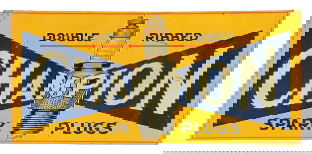 CHAMPION SPARK PLUGS EMBOSSED TIN SIGN W/ SPARK PLUG GRAPHIC: SST. C. 1930s. CONDITION: Very good color and gloss throughout the field, showing light surface scratches with a few minor areas of paint loss. Added nail holes in the outer field with light wear alon