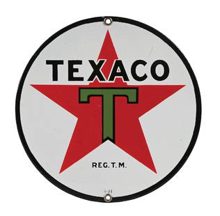 TEXACO PORCELAIN SIGN W/ STAR GRAPHIC: SSP. Marked "3-31". CONDITION: Excellent color and gloss throughout, showing minor stress lines in the field as well as some minor surface scratching. Mounting holes showing minimal use wear, and the
