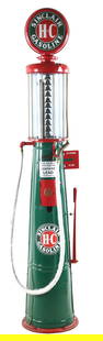 GILBERT & BARKER 10 GALLON VISIBLE GAS PUMP RESTORED IN SINCLAIR H-C GASOLINE: CONDITION: Pump shows an excellent restoration done in Sinclair Gasoline, showing new Sinclair pump plates with white cloth hose and brass nozzle. Pump shows minor denting in the skins with light wear