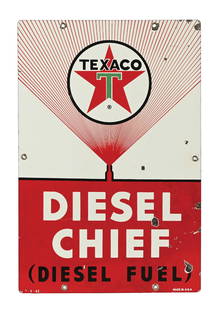 TEXACO DIESEL CHIEF PORCELAIN PUMP PLATE SIGN: SSP. Dated 1963. CONDITION: Fair color and gloss, with areas of spotting and discoloration in the white. Moderate chipping in the outer field, as well as surface scratching with light chips at the mou