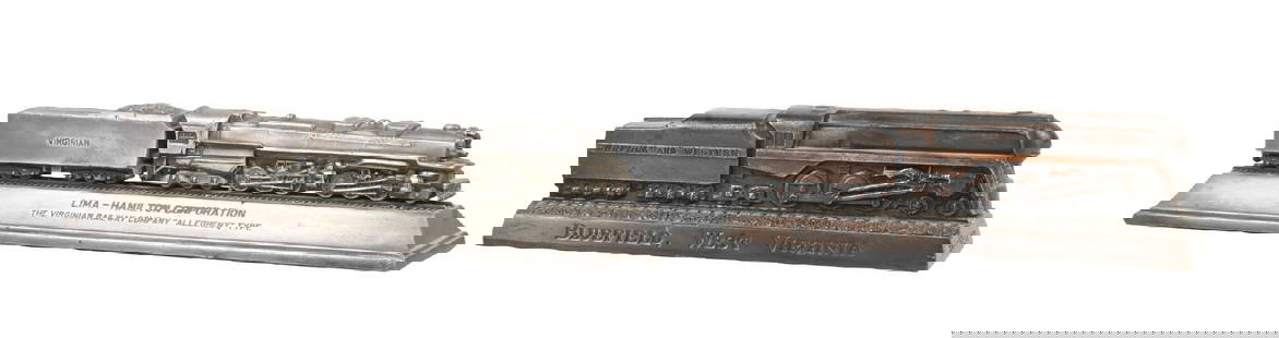 LOT OF 2 RAILROAD LOCOMOTIVE DESK PAPERWEIGHTS: (A) A brass Lima-Hamilton Corporation desk paperweight model of the Virginian Railway Company 2-6-6-6 Articulated Allegheny-type locomotive. The base reads “Lima-Hamilton Corporation / The