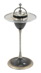 N&W RAILROAD PARLOR CAR SMOKE/DRINK STAND: A single-column weighted stand with ash receptacle and drink pedestal. This unit is nicely marked with the curved N&W logo medallion on the base. Some of the original plating is worn off the base