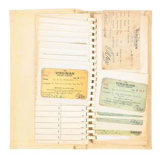 BOOK OF RAILROAD PASSES: A book of Virginian Railroad passes, beginning in 1908 through 1956, but missing several date years. Passes are printed on card stock. Condition: (Good). Dimensions: 5 - 3/4" x 12".