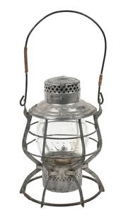 N&W RAILROAD LANTERN: An A&W Reliable double steel guard model with big fount and No. 2 ratchet burner intact. The lid reflector is marked &#8220;N&W. Ry&#8221;. The clear No. 39 Corning-style globe is a scarce version, em