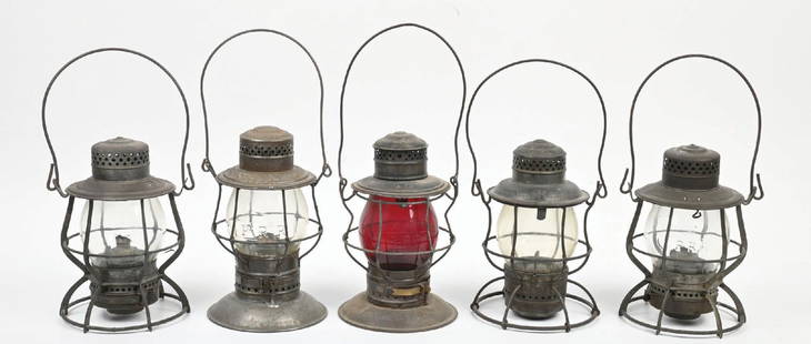LOT OF 5 RAILROAD LANTERNS: (A) A Keystone &#8220;Casey&#8221; single-guard model, nicely embossed &#8220;P. R. R.&#8221; on the lid reflector. The correct fount and burner are intact. The clear globe is an unmarked Corning non-