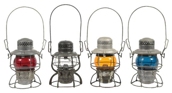 LOT OF 4 RAILROAD LANTERNS: (A) An Armspear 1925 Kero model, complete with a No. 400 fount and burner set and marked “N&W. Ry” on the lid reflector. The red Kero globe is not marked. (Very Good). (B) An Armspear 1925