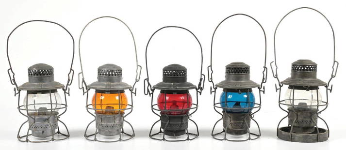 LOT OF 5 RAILROAD LANTERNS: (A) An Adlake Kero with a 1-64 manufacture date, marked &#8220;N&W RY&#8221; on the lid reflector. An Adlake No. 400 fount and burner unit are intact. A clear unmarked Kero globe shows normal railroad