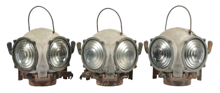 LOT OF 3 CANNONBALL LOCOMOTIVE CLASSIFICATION LIGHTS: Three Pyle-National Company electric locomotive classification lights that can display either clear or green aspects. The electrical wiring has been cut at the base. These have not been tested for fun