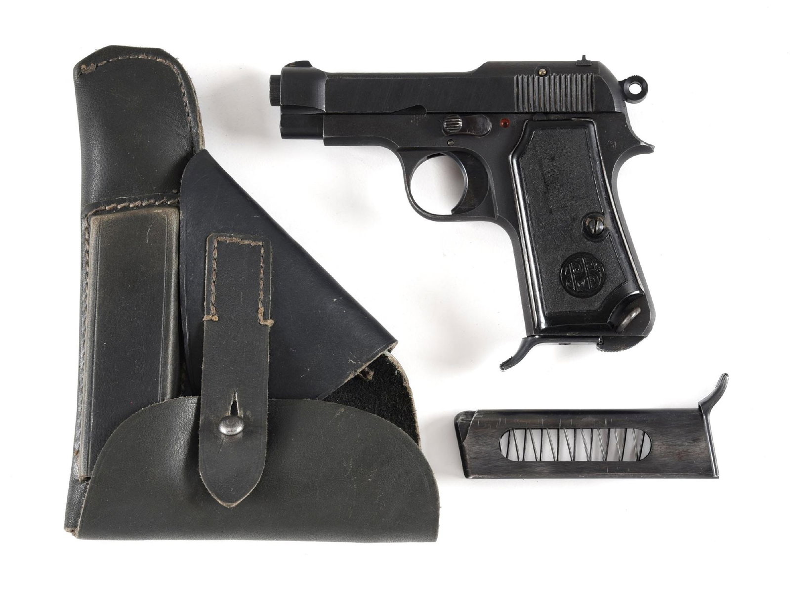 (C) WARTIME GERMAN INSPECTED BERETTA MODEL 1934 SEMI-AUTOMATIC PISTOL.: This pistol has a "4 UT" stamp on left side of frame, which indicates it was German inspected for issue to the 4th Technical Control Unit of the German army. Features the matte blue black finish with 