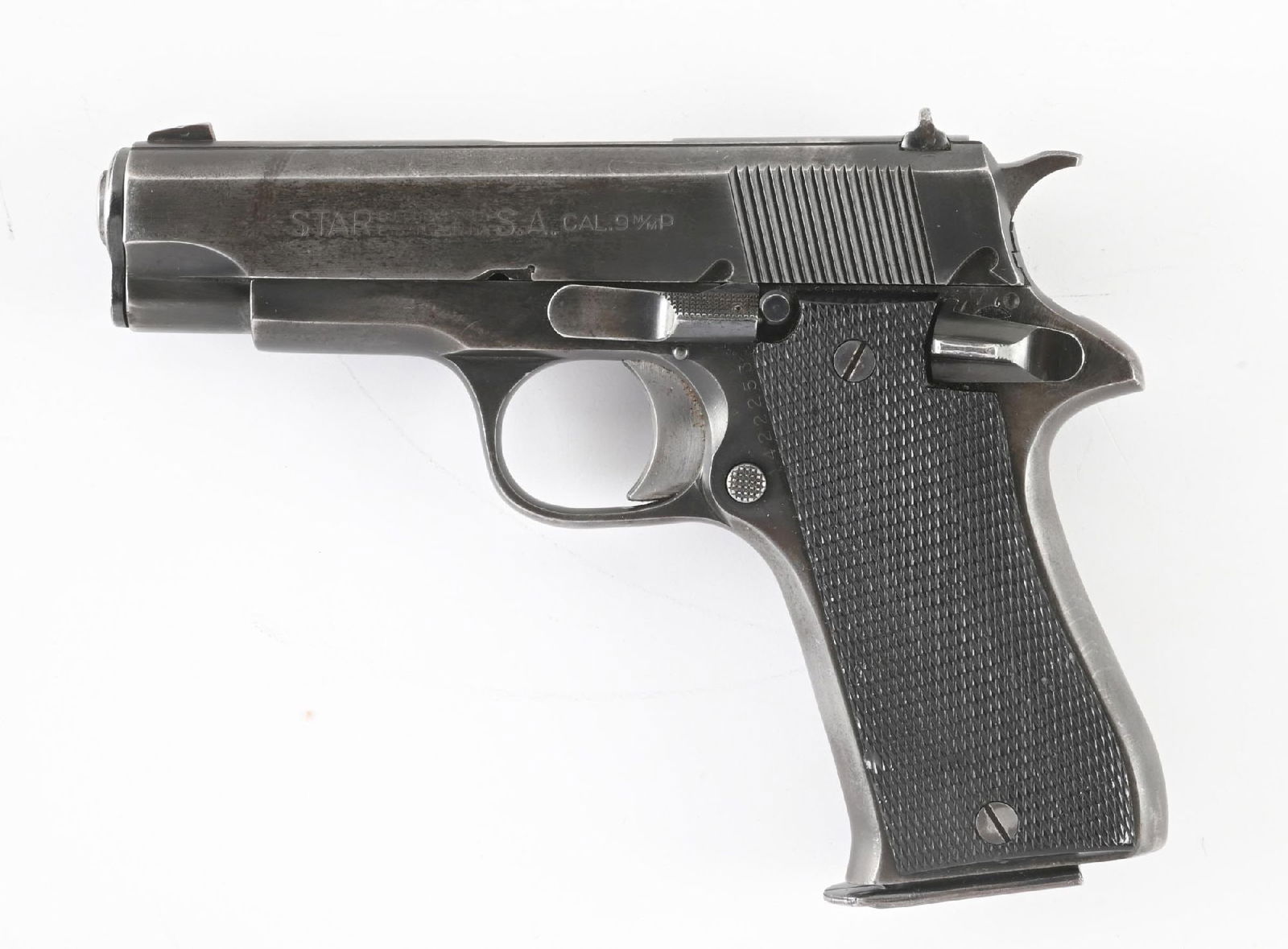(M) STAR MODEL BM SEMI-AUTOMATIC PISTOL.: Standard features with a blue finish and 2-piece black checkered plastic grips. "C.A.I." import stamped. CONDITION: Very Good, lightly frosted bore with good rifling. Housed in a factory box in fair c