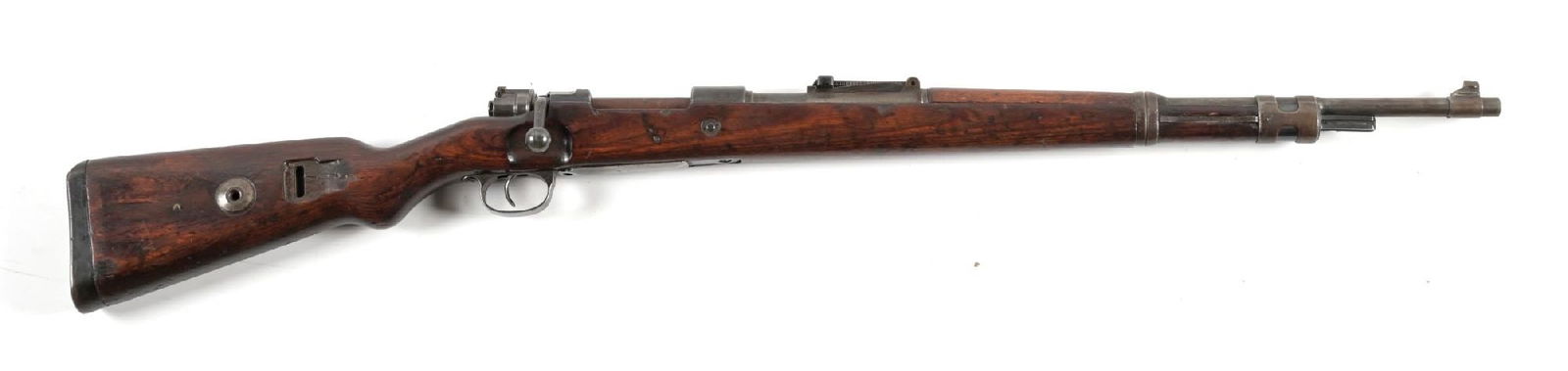(C) MAUSER BYF 43 CODE K98 BOLT ACTION RIFLE.: Manufactured in 1943. Full military configuration as arsenal rewarked post-war including blued finish, standard sights, laminate stock, milled mounts, and a cupped butt plate. Several waffenamts are m