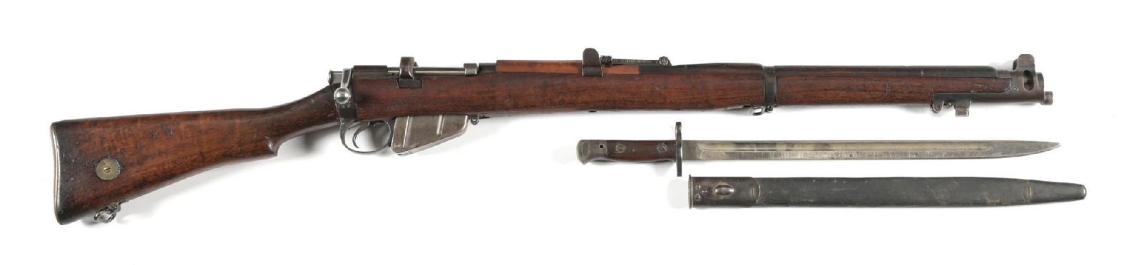 (C) WWI ENFIELD SHTLE III BOLT ACTION RIFLE (1918).: Dated 1918. Standard features, two magazines, and a 1917 bayonet with sheath. Metal has numerous British proofs. The stock is stamped "FR". Right side has the brass disc with a brass butt plate. CONDI