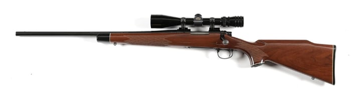 (M) LEFT HANDED REMINGTON 700 BDL BOLT ACTION RIFLE.