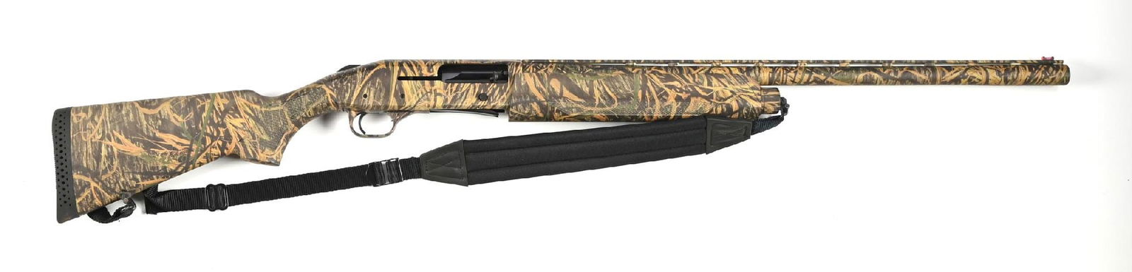 (M) MOSSBERG 935 ULTI MAG SEMI-AUTOMATIC SHOTGUN.: Mossy Oak camouflage finish, factory low rise vent rib with a single Hi-Viz bead front sight, checkered polymer stock with a pistol grip, matching forearm factory, and Decelerator rubber recoil pad. C