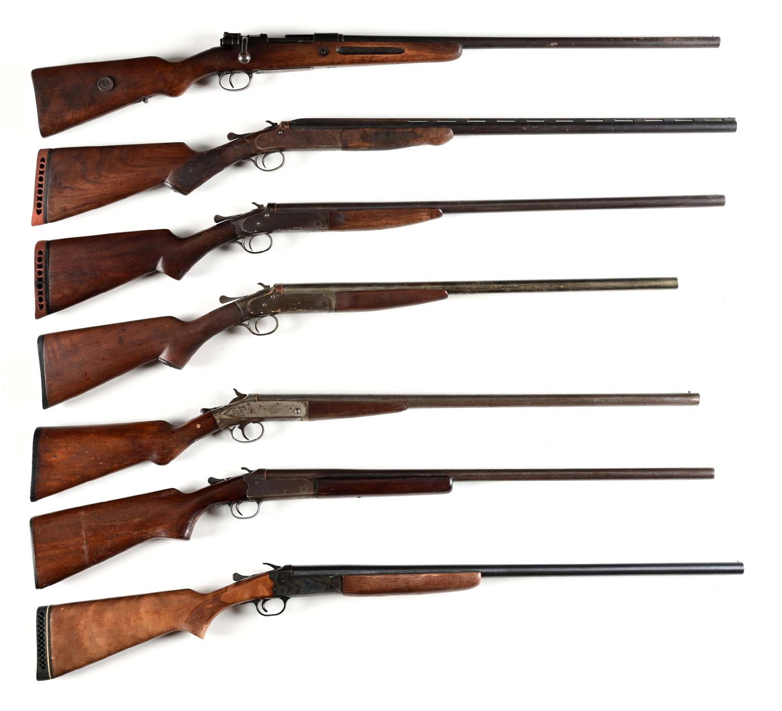 (C) LOT OF 7: BOLT ACTION AND BREAK ACTION SHOTGUNS.: Lot includes a German Mauser bolt action shotgun and 6 various break action shotguns by Iver Johnson, Savage, and Bright Arms Co., including an Iver Johnson Special Trap. All are finished in blue with