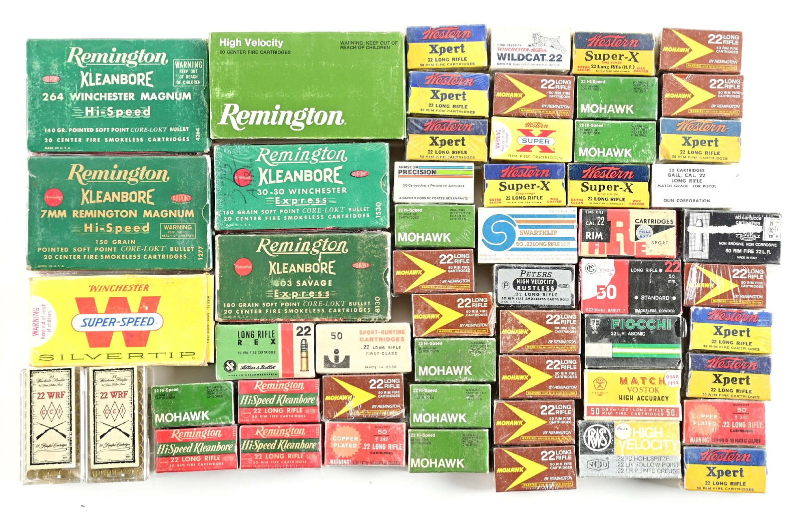 LOT OF FORTY SEVEN BOXES OF MOSTLY COLLECTIBLE AMMUNITION.: Includes four boxes of 1940-50 Remington C.F ammo, .303 British, 30-30, 7mm, .264 Win. (2) boxes of CCI .22 WRF . Balance is all .22 long rifle ammo. Ten assorted boxes of foreign made, (11) Remington