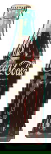 COCA-COLA DIE-CUT TIN BOTTLE SIGN: SST. Maker marked "AM-44". A nice example of this c. 1964 single-sided die-cut and embossed tin bottle sign from Coca-Cola featuring the iconic contour bottle graphic. CONDITION: The sign has two nota