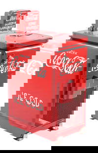 COCA-COLA WESTINGHOUSE VENDING COOLER: This c. 1940s cooler from Westinghouse was made for Coca-Cola with the iconic company logos embossed on all four sides, as well as the coin mechanism. CONDITION: This cooler has been restored at some