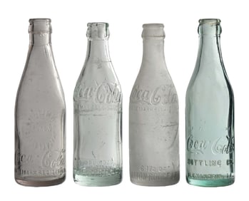 COLLECTION OF 4 COCA-COLA STRAIGHT-SIDED GLASS BOTTLES