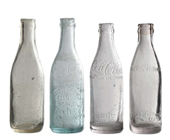 COLLECTION OF 4 GLASS COCA-COLA BOTTLES
