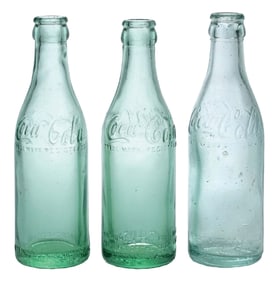 COLLECTION OF 3 COCA-COLA STRAIGHT-SIDED N.C. GLASS BOTTLES