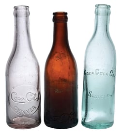 COLLECTION OF 3 COCA-COLA STRAIGHT-SIDED GLASS BOTTLES