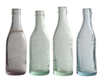 COLLECTION OF 4 GLASS COCA-COLA BOTTLES