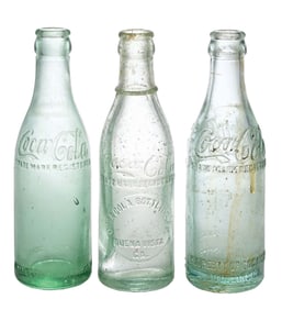 COLLECTION OF 3 COCA-COLA GLASS BOTTLES