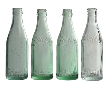 COLLECTION OF 4 COCA-COLA STRAIGHT-SIDED GLASS BOTTLES