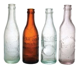 COLLECTION OF 4 COCA-COLA STRAIGHT-BODIED GLASS BOTTLES