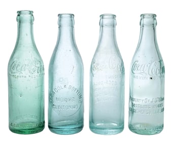 COLLECTION OF 4 COCA-COLA STRAIGHT-SIDED GLASS BOTTLES